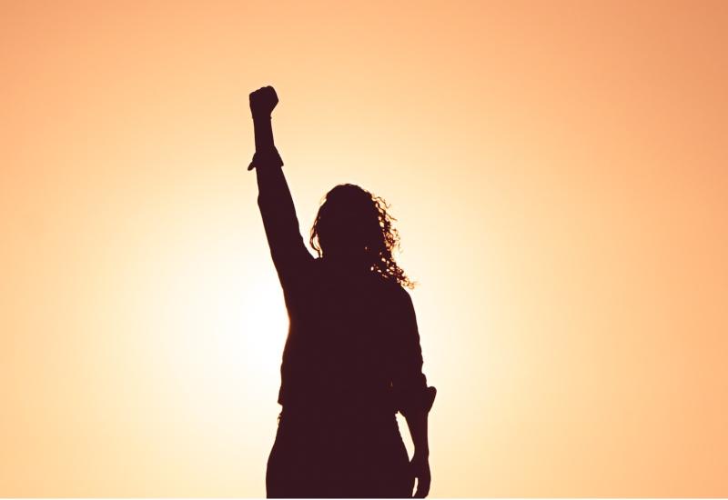 Woman with fist in air
